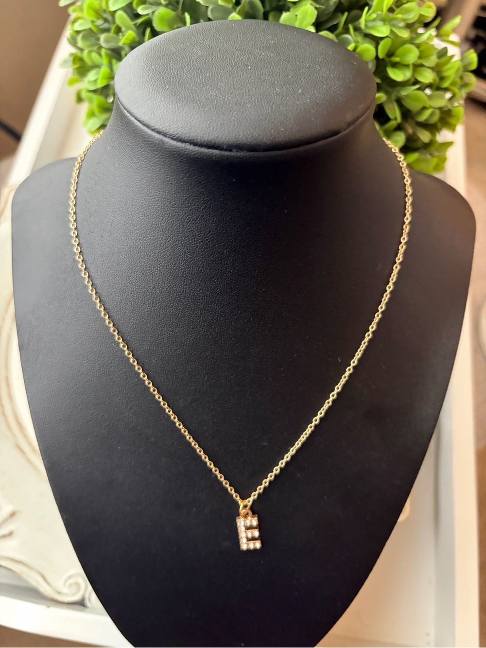 Gold tone Initial E Pendant Necklace with Crystal Accents